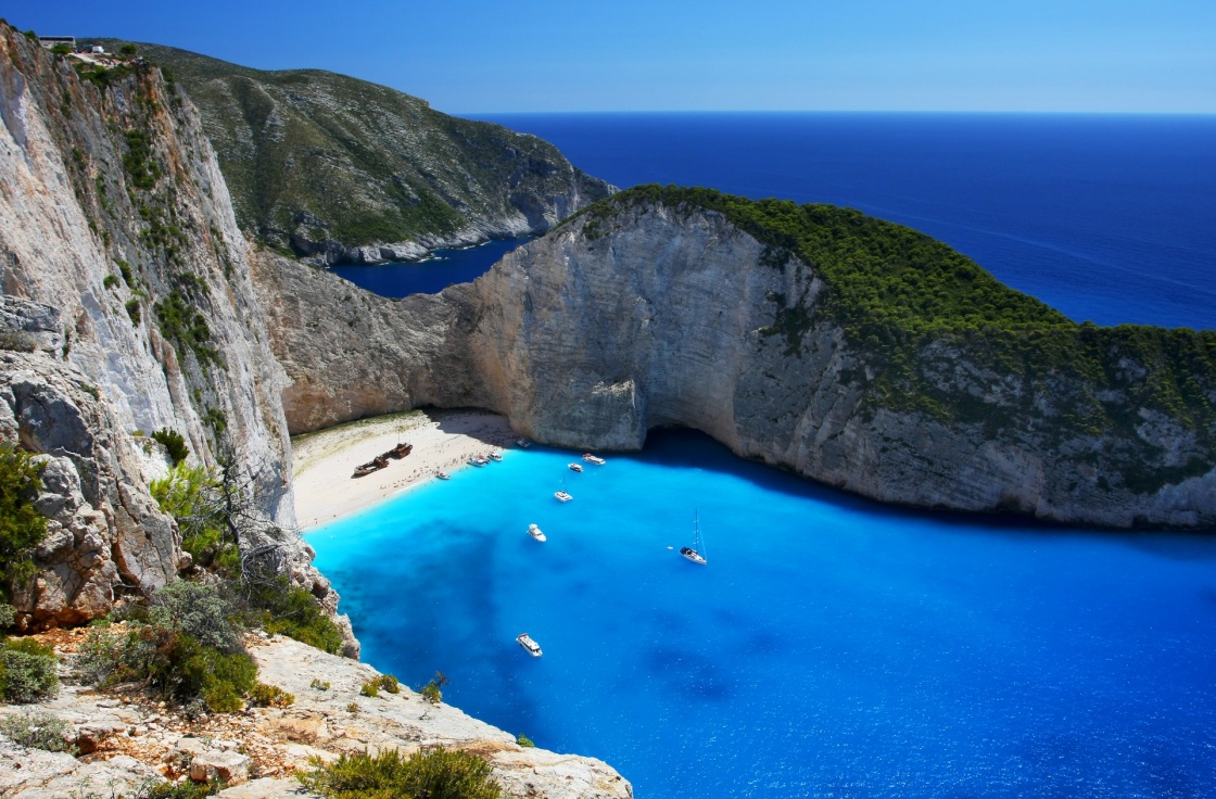 'Navagio - the most famous beach on Zakynthos island with shipwreck and anchoring boats  (Greece, Ionian islands)' - Zante